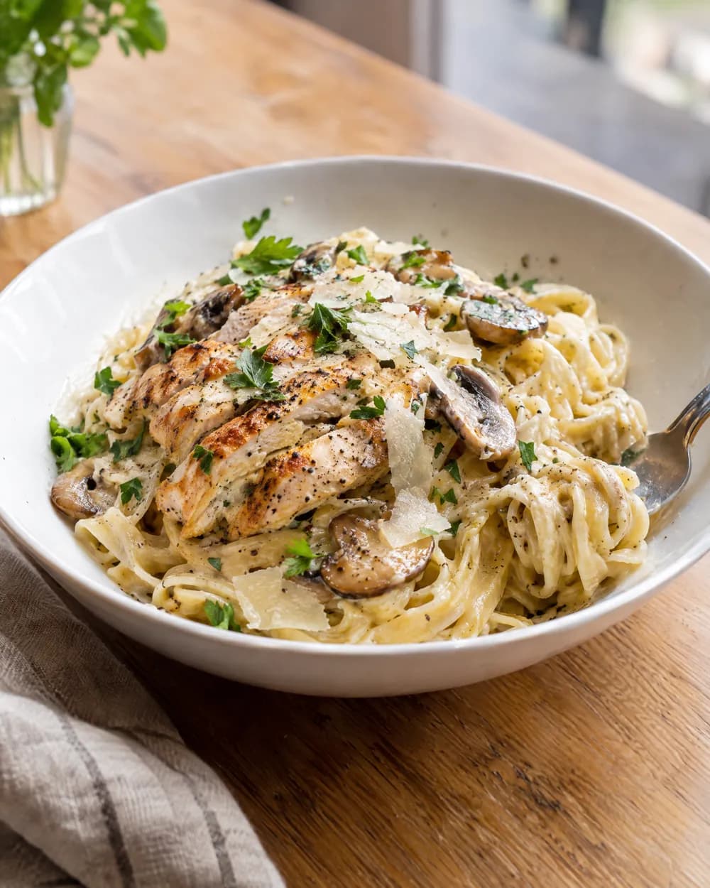 Fettuccine Alfredo with chicken and mushrooms